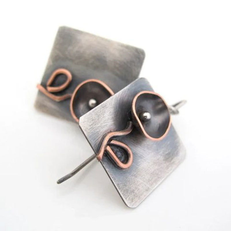 Pendientes geométricos florales hechos a mano | metal con personalidad.