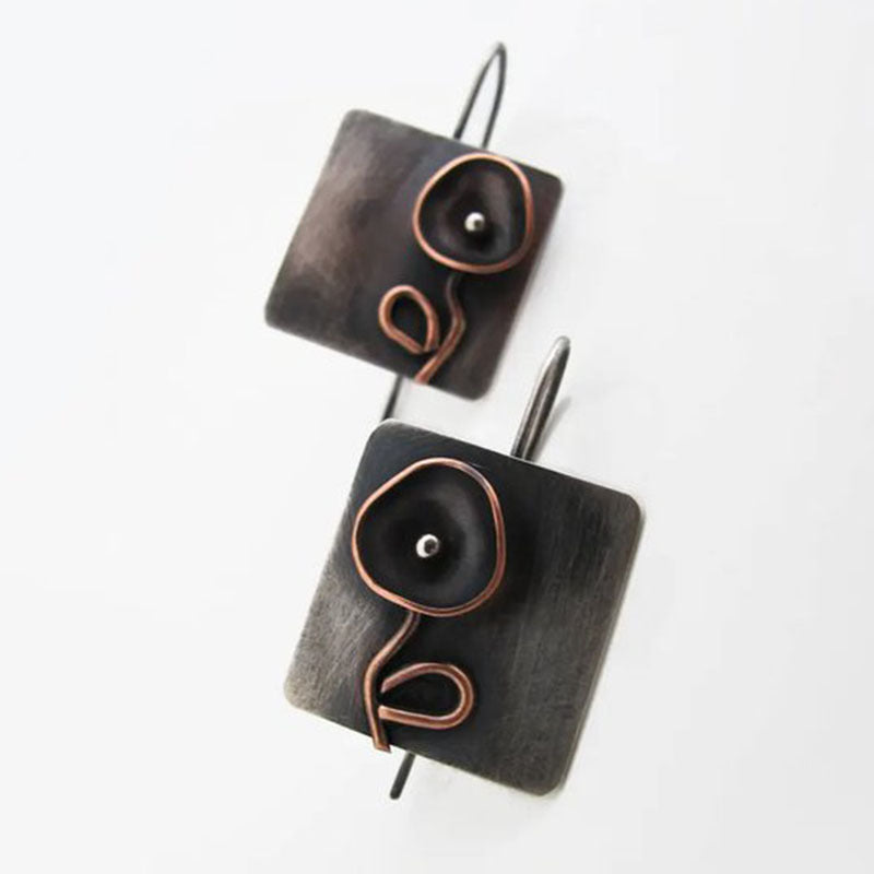 Pendientes geométricos florales hechos a mano | metal con personalidad.